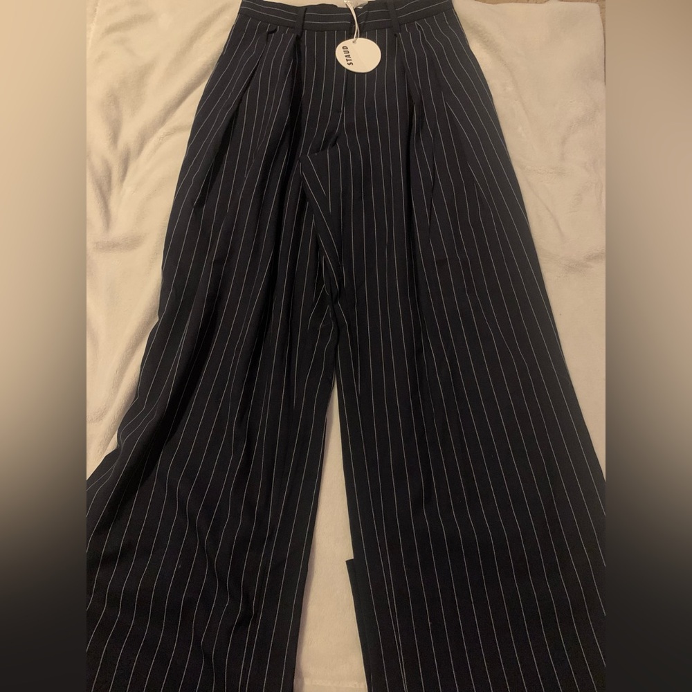 Navy pinstripe pants by STAUD